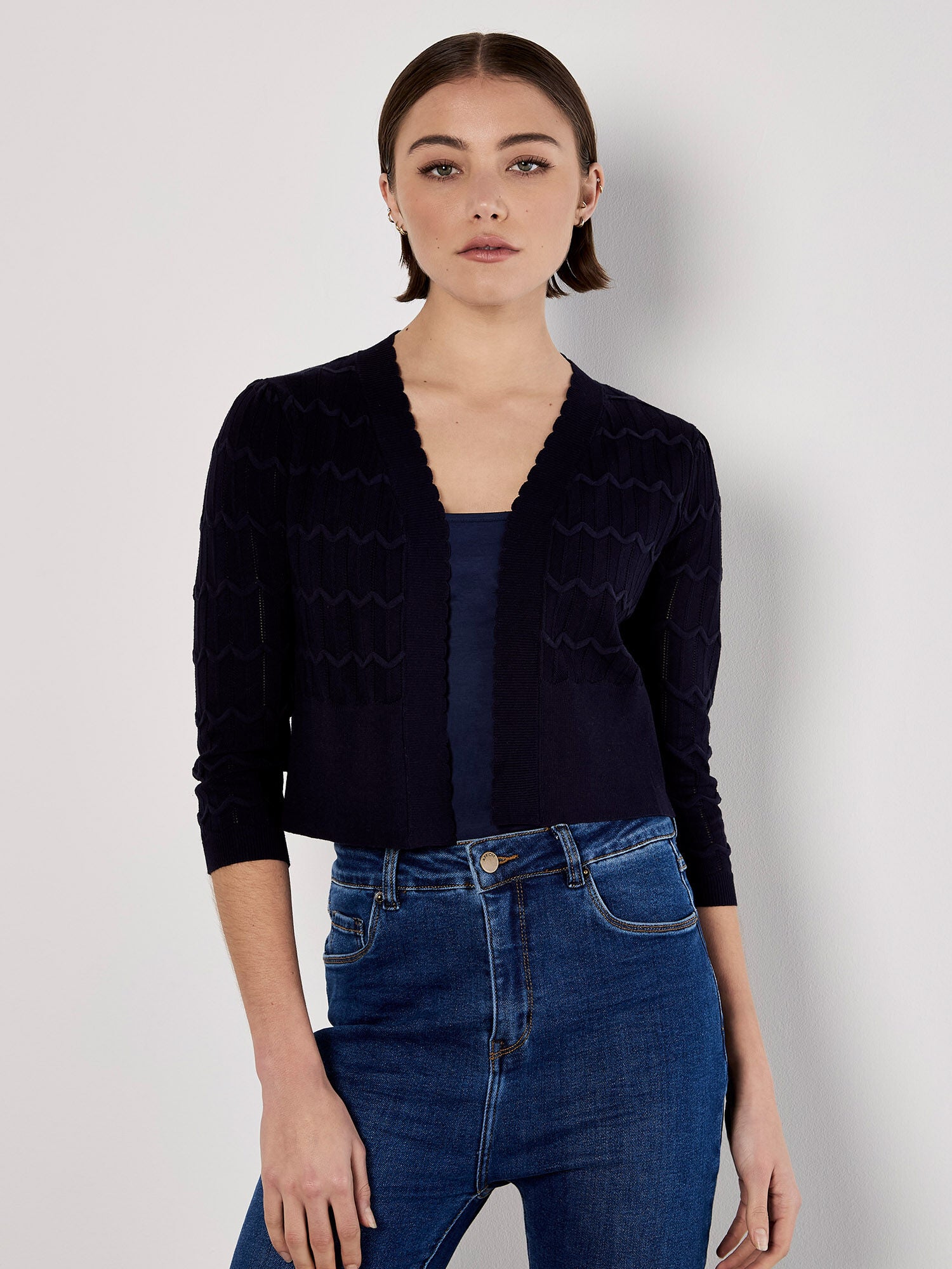 APRICOT POINTELLE CHEVRON SHRUG